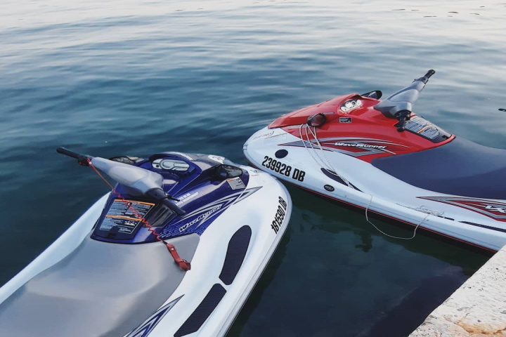 A person on a jet ski driving