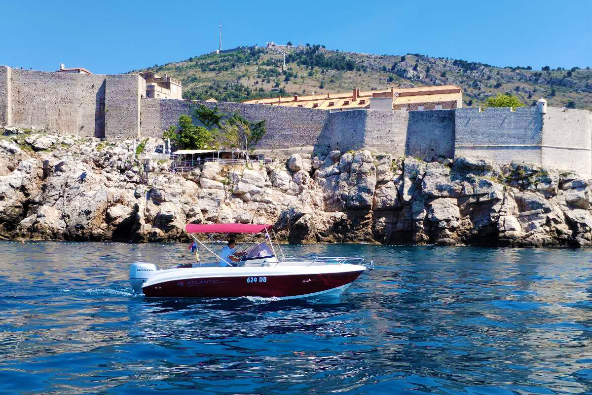 Our boat passing the old walls of Dubrovnik's Old Town